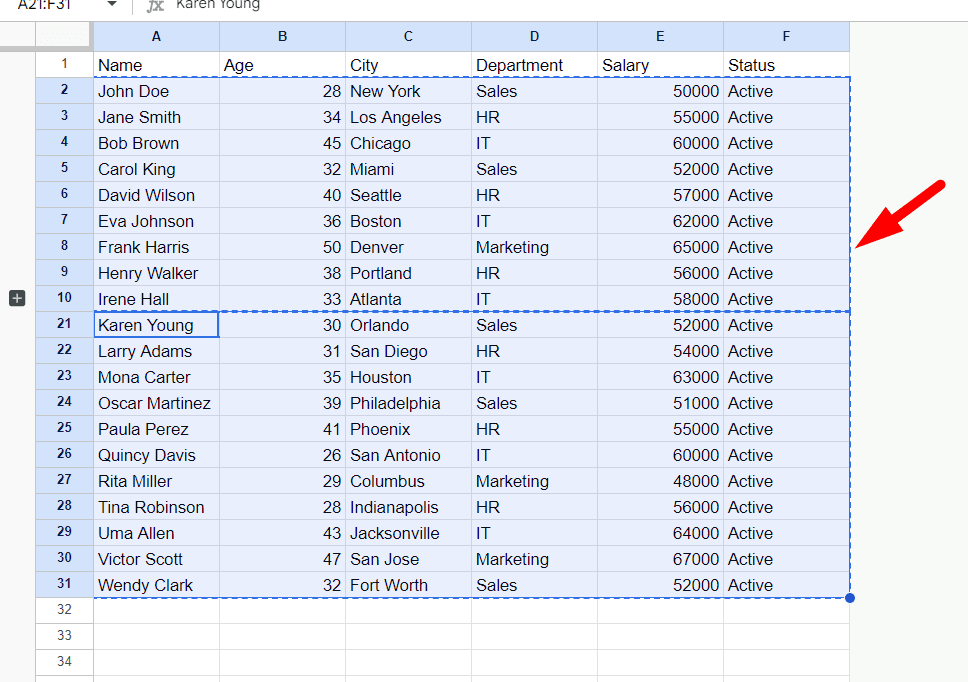 red arrow pointing to dotted blue border in google sheet