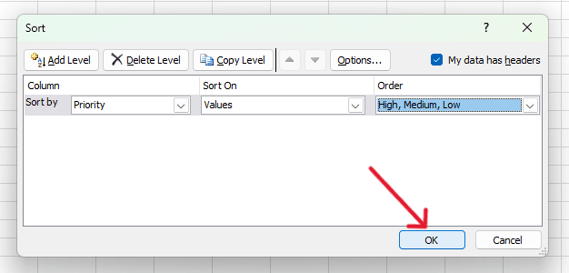 red arrow pointing to ‘OK’ button to apply the sort