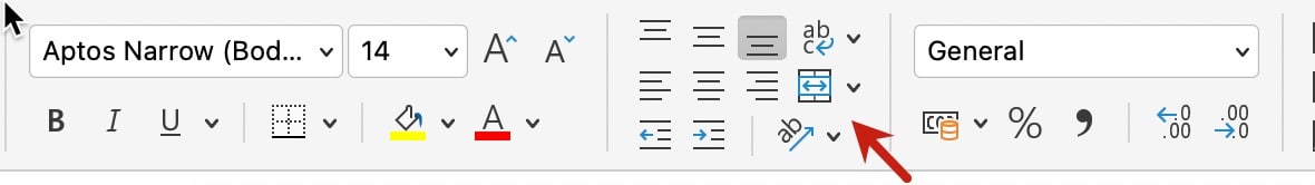 A red arrow pointing towards a section in the ribbon bar
